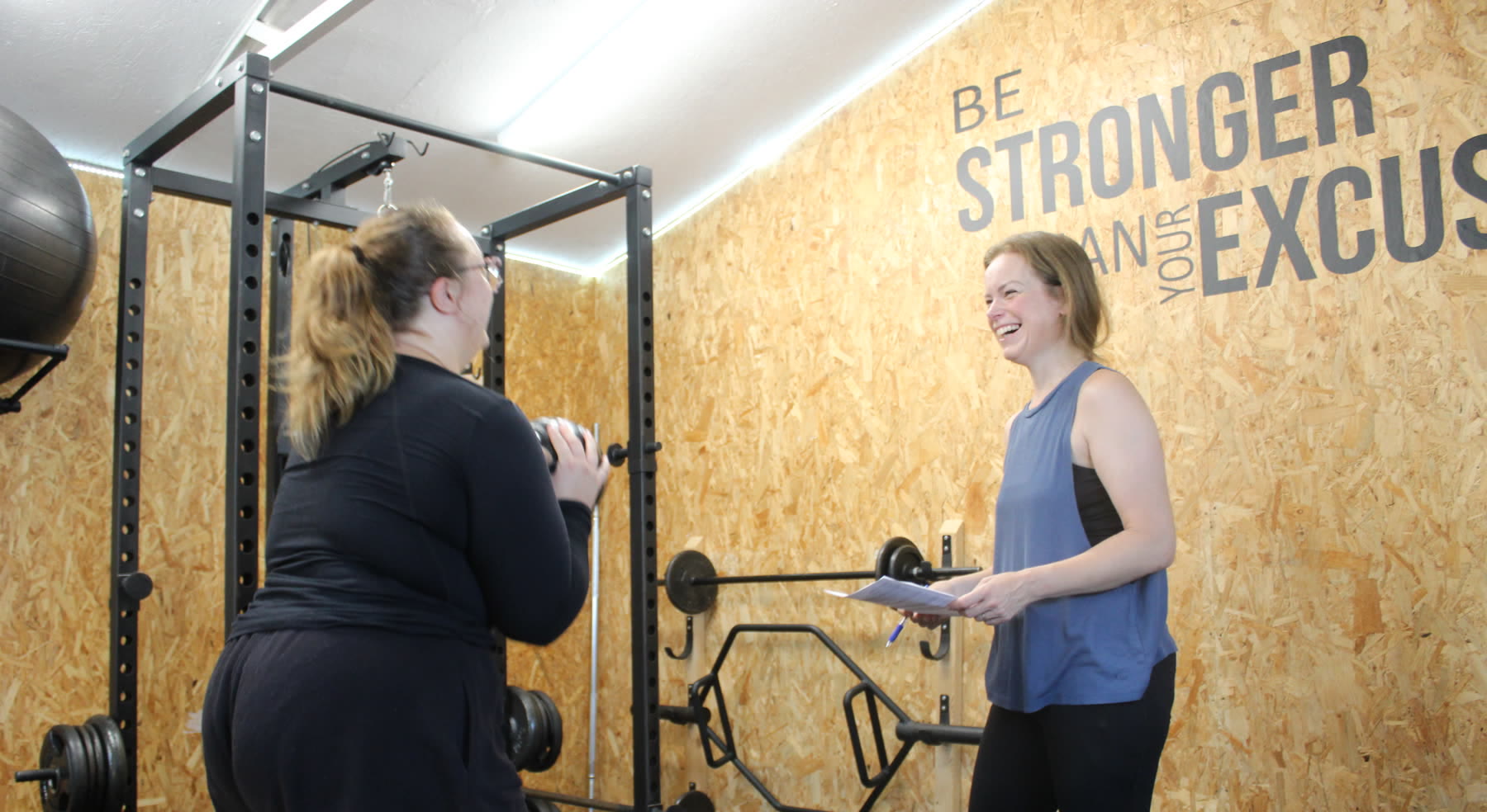 Esther Fair reviewing a client's programme together in her private Worthing studio