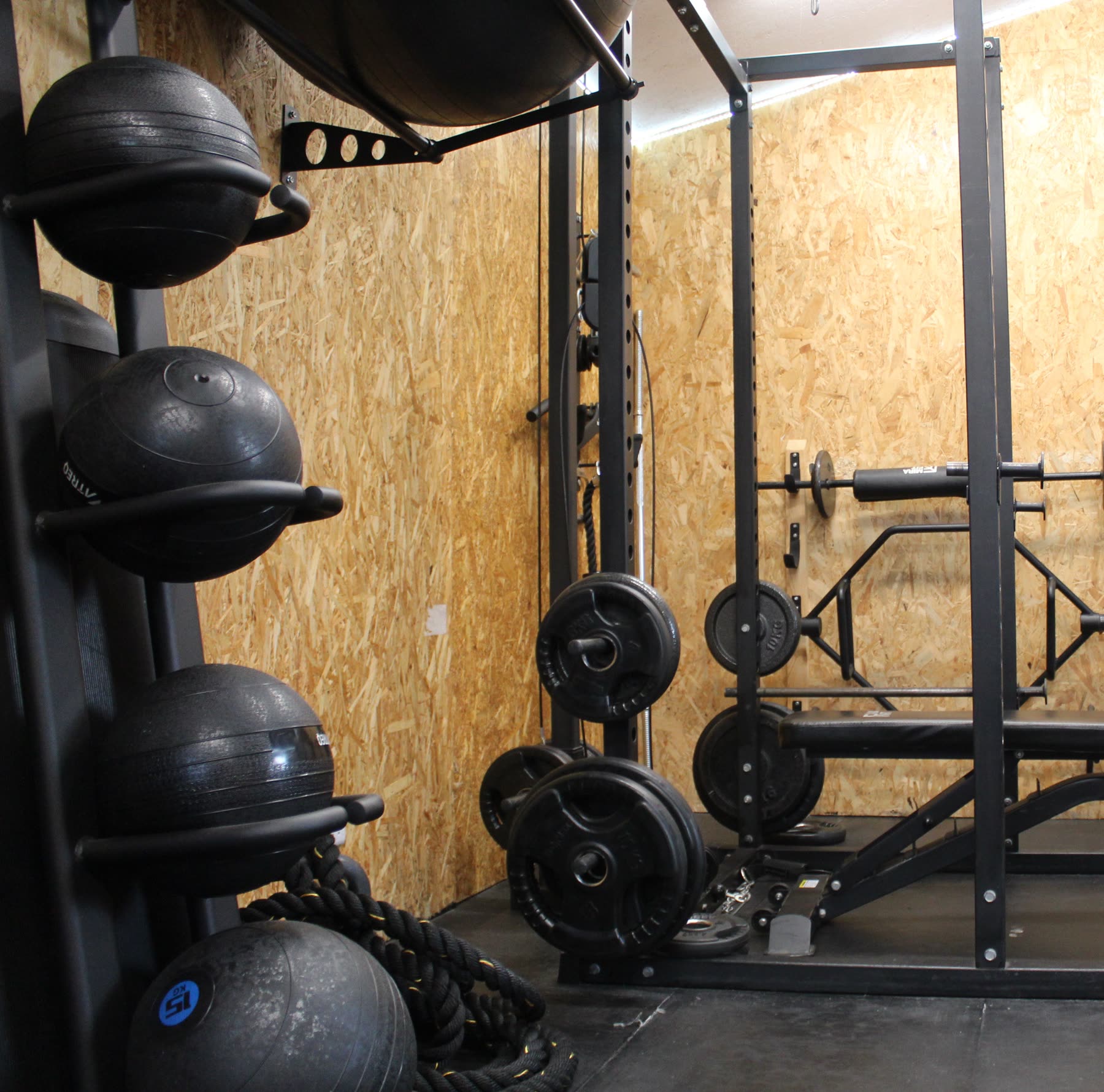 Slam balls racked in the Eternal Fitness studio